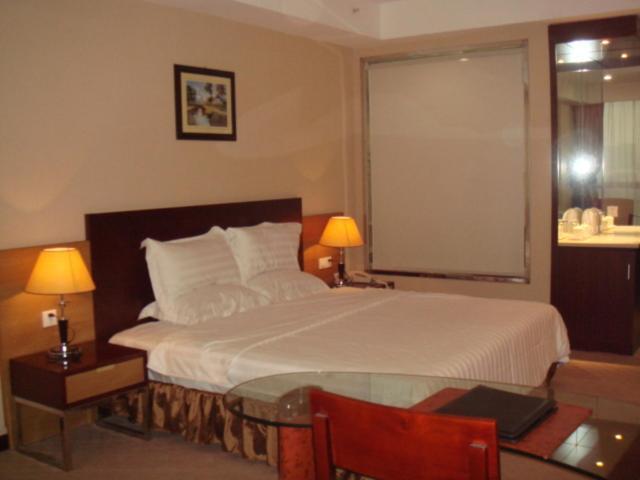 Neighbourhood Holiday Hotel Suzhou Szucsou Szoba fotó