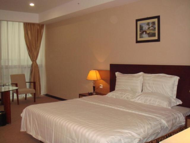 Neighbourhood Holiday Hotel Suzhou Szucsou Szoba fotó